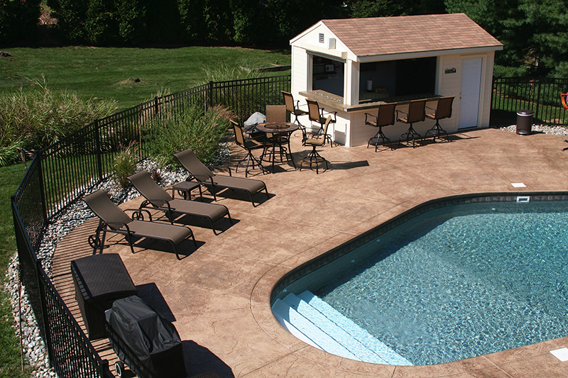 Swimming pool and stamped concrete project example 77